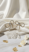 Elegant Gold Plated Bow Drop Earrings with American Diamonds | Diaura Jewels – Festive Party Wear ₹669 - DIAURA JEWELS