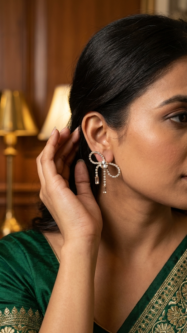 Elegant Gold Plated Bow Drop Earrings with American Diamonds | Diaura Jewels – Festive Party Wear ₹669